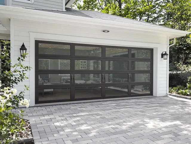 Ledyard Garage Door Repair design specialist presenting custom garage door options to Ledyard homeowner
