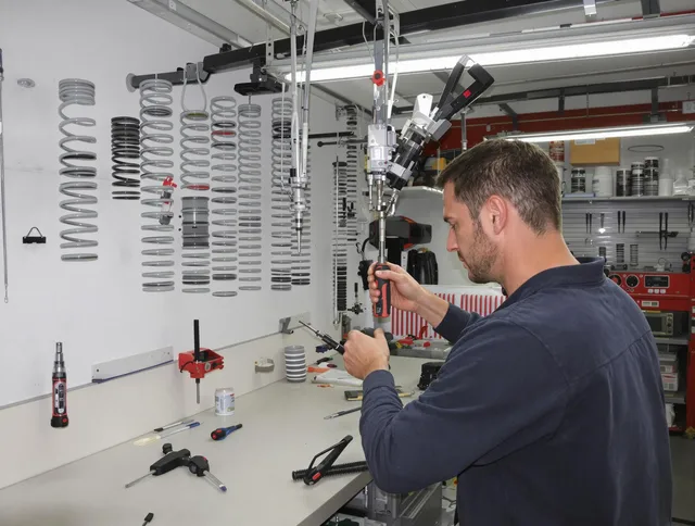 Ledyard Garage Door Repair safety certified technician performing precision spring replacement in Ledyard