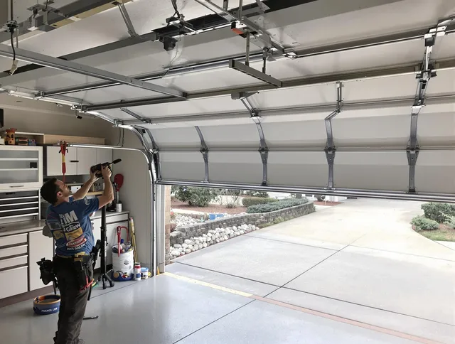 Garage door track repair service by Ledyard Garage Door Repair in Ledyard